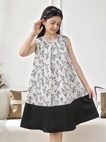 فستان من البناتالصغيرات مطبوع بالأزهار مخصر بشكل جيب مع فيونكة خلفية، سيلويت مرتفع وأنيق