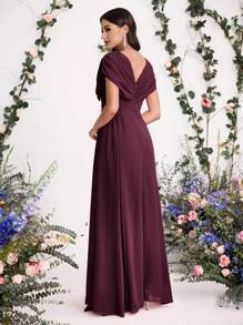 Coutiva Suknia dla matki panny młodej z haftem kwiatowym 3D i kryształkami zdobiona kokardą