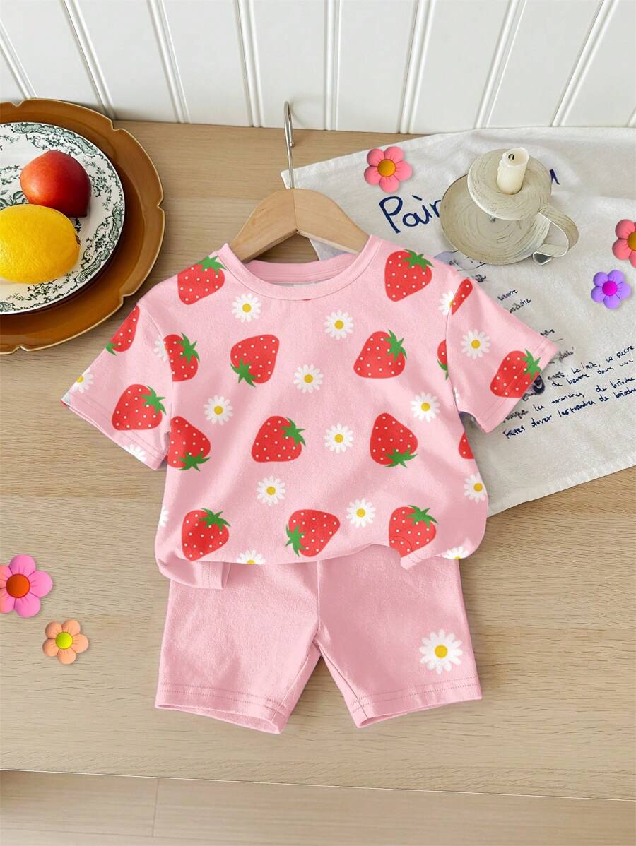 SHEIN Bộ đồ liền thân tay ngắn cổ tròn rộng rãi họa tiết hoa cúc dâu tây hoạt hình màu hồng dễ thương cho bé gái + quần short bó, phù hợp cho mùa xuân/hè - Nhiều màu - Xem 1