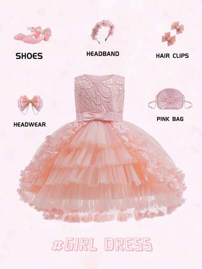 年轻女孩优雅粉色网纱连衣裙，正式场合着装