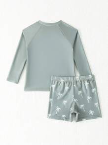 SHEIN Conjunto de traje de baño de niño pequeño estampado con palmeras, elegante y adorable. Conjunto de 2 piezas para niños pequeños. Ropa de playa para niños de 3 a 7 años