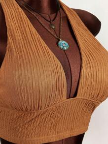 Amplova Set de 2 piezas con top corto con escote en V profundo y espalda de atar y pantalones cortos de cintura baja con textura - Naranja - Ver 6