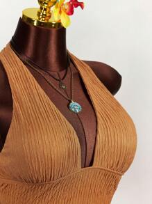 Amplova Set de 2 piezas con top corto con escote en V profundo y espalda de atar y pantalones cortos de cintura baja con textura - Naranja - Ver 11