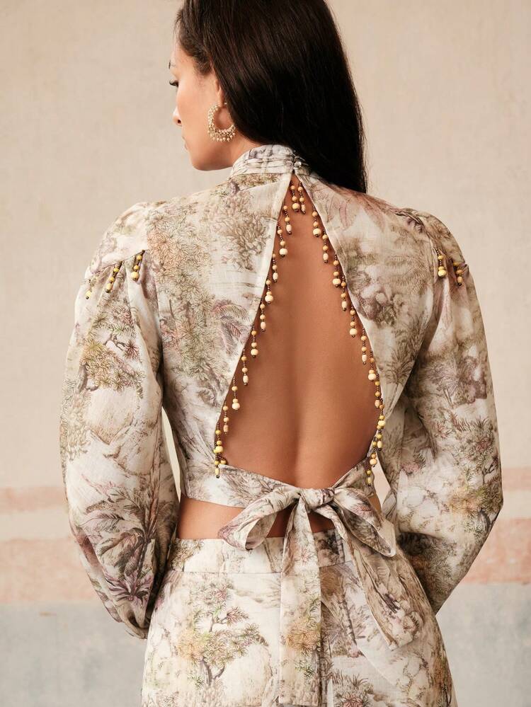 Conjunto de 2 piezas de mujer con camisa superior con estampado floral de manga farol y espalda descubierta con nudo, y falda midi con volantes, ideal para vacaciones, festivales, graduación en primavera/verano