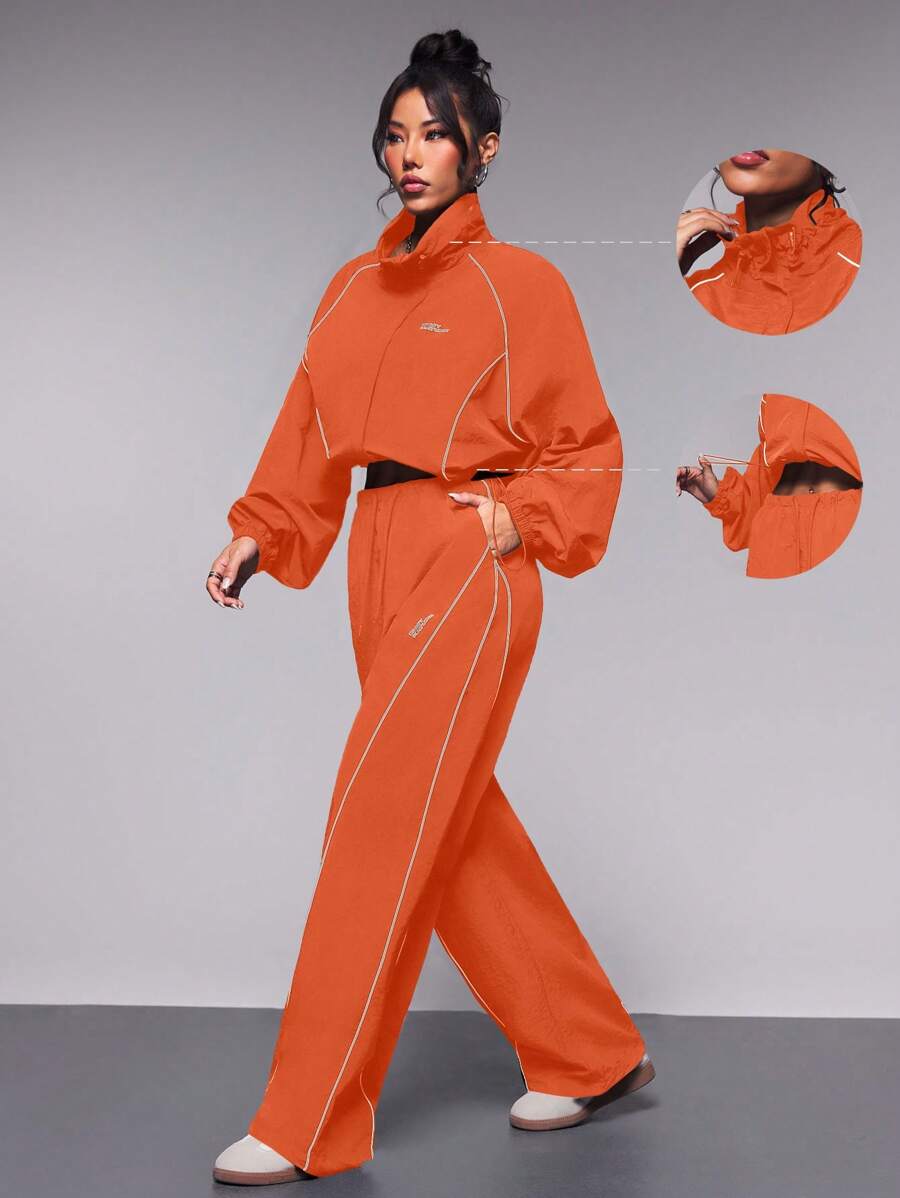 SHEIN Sports Bộ đồ thể thao quần dài và áo khoác cổ cao có dây rút tương phản dành cho nữ - trái cam - Xem 1