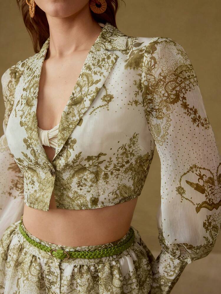 Blusa con stampa all-over e un solo bottone