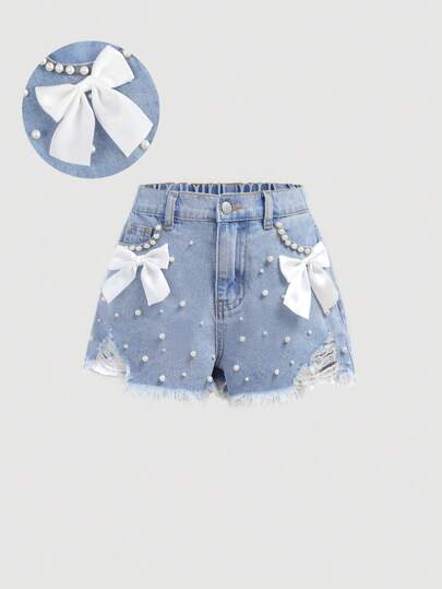 SHEIN Girlism Shorts vaqueros elegantes y desgastados con lazo, bolsillo con inserto, perlas falsas y dobladillo deshilachado para niña preadolescente, para vacaciones de primavera y verano, y festivales