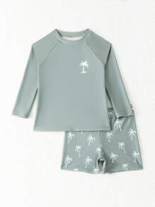 SHEIN Conjunto de traje de baño de niño pequeño estampado con palmeras, elegante y adorable. Conjunto de 2 piezas para niños pequeños. Ropa de playa para niños de 3 a 7 años