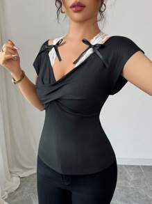 Elenzga Camiseta de manga larga con escote en V y estampado de mariposa para mujer, diseño elegante, ajuste ceñido, versátil, nuevo lanzamiento de primavera/verano