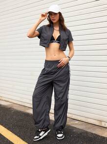 Streetz SHEIN Sport Conjunto de ropa deportiva para mujer compuesto por una blusa de manga corta con cremallera y ribete contrastante, y pantalones largos con rayas laterales