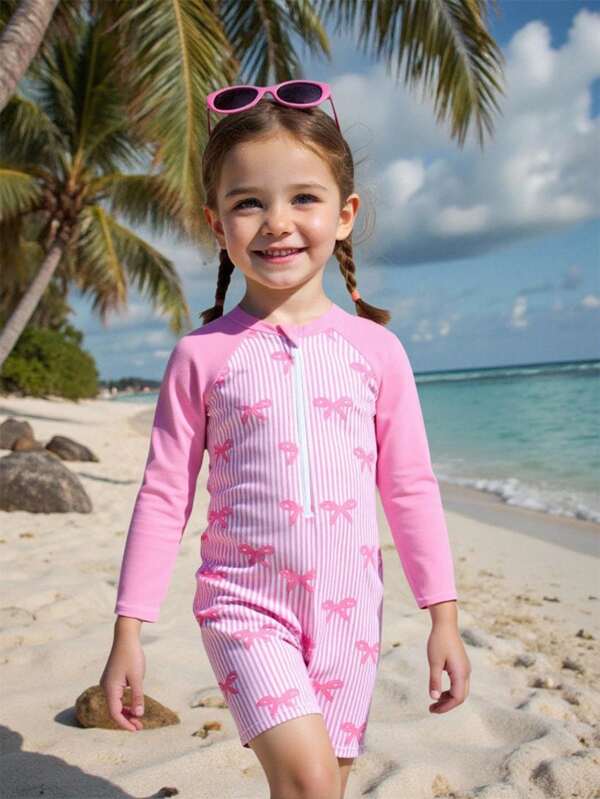 SHEIN قطعة واحدة من ملابس السباحة للفتيات، مطبوع بنقشة الفراشة والشريط والعقدة، على شكل قطعة واحدة مقسمة، للاستخدام في العطلات والشاطئ