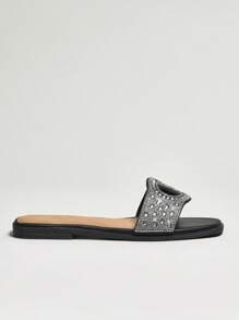 SHUZIA Sandalias deslizables de mujer Luxe Glow negras con detalles con cristales y logotipo dorado | Comodidad y lujo para el estilo de verano de resort a cafetería - Negro - Ver 5