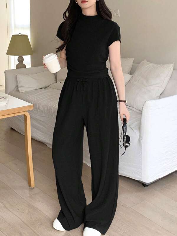SHEIN Teen Girl Spring &Summer Solid Color Black Color Three-Dimensional Embossed Letter Pattern Knitted Round Neck Casual Loose Short-Sleeved T-Shirt Top Casual Loose Trousers Suit,School Clothes,Basic,Daily,Suitable For Various Occasions, Back To School, Campus Style