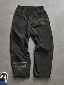Manfinity Sport Corelite Pantalones deportivos de hombre con estampado de eslogan y dobladillo con cordón