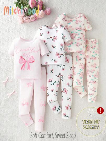 Young Girl 6 Pieces Short Sleeve And Long Pants Snug Fit Bow And Flower Print Pajamas Set. This Pajama Set Is Suitable For Young Girl To Wear At Home Casually, Can Be Worn As Sleepwear Or Indoor Leisure Wear. The Simple Design Makes It Easy To Mix And Match, Allowing Young Girl To Exude Fashion And Vitality At Home. Stretchy And Breathable Knit Fabric, Machine Washable, Comfortable Fit, And Easy Care. (2 Sets Are Sold Separately)
