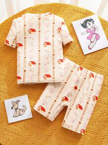 Astro Boy X SHEIN Conjunto de pijama con top de manga corta y shorts con estampado de dibujos animados para niña, color amarillo