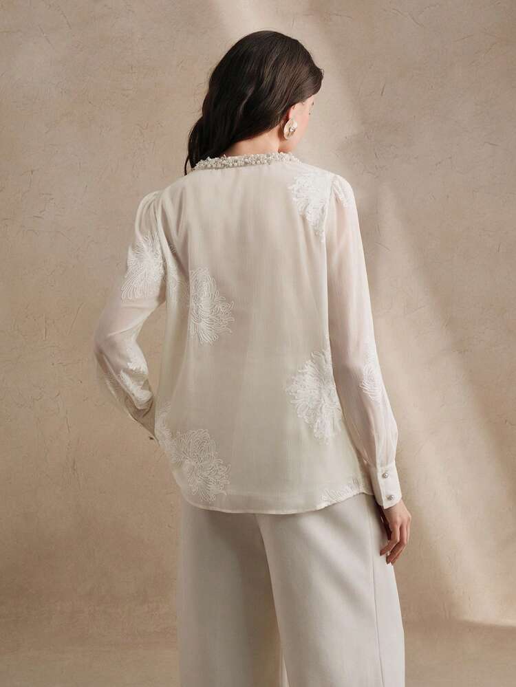 Blusa de manga larga de chifón pesada con bordados florales 3D y cuello redondo de doble capa para mujeres