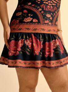 CAJUNI Vestido corto casual de playa negro con estampado floral tropical colorido y tirantes de espagueti para mujer de talla grande