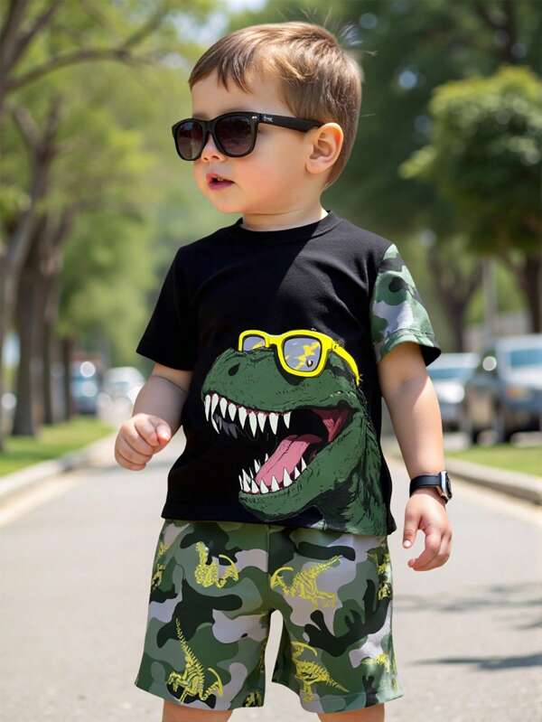 GraphicGems 1 set de ropa para niños pequeños, camiseta con estampado de dinosaurios con gafas de sol, pantalones cortos con estampado de camuflaje y dinosaurios, manga corta y pantalones cortos, tela ligera sin felpa, ropa casual de calle, opción brillante para primavera/verano