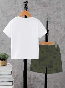 SHEIN Playful Pals 1 Set Toddler Cartoon Style T-Shirt And Shorts Set, T-Shirt With Adorable Green Dinosaur Head Print, Shorts With All-Over Blue Dinosaur And Fossil Pattern, Short Sleeve Shorts, Lightweight, Suitable For Daily Wear, Spring/Summer - Multicolor - View 2