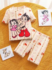 Astro Boy X SHEIN Conjunto de pijama con top de manga corta y shorts con estampado de dibujos animados para niña, color amarillo