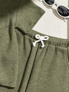 SHEIN 2pcs Young Boy Loose Casual Turndown Collar Short Sleeve Polo Shirt And Pants Set