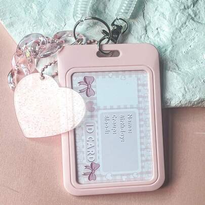 1 件粉色卡套，带心形设计扣，创意多用途卡夹，适合学生返校使用