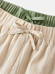 SHEIN Set de 2 pantalones anchos de pierna ancha con textura tejida y moño casual para niñas preadolescentes, estilo vacacional
