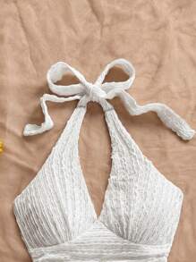 Soleia Bộ đồ đi nghỉ cho nữ: Áo hở vai cổ yếm họa tiết màu be không tay và chân váy mini xếp nếp hai lớp - trắng - Xem 5