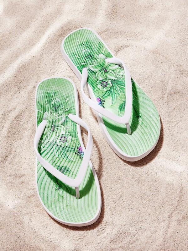 Flip flops de moda para mujer con tira en T en color negro
