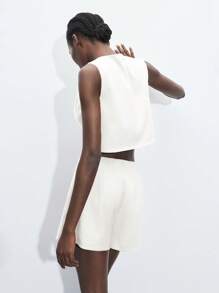 Maija 圆领宽松无袖上衣搭配中腰西装裤套装，现代都市风女装两件套，时尚简约，适合秋冬季穿着。 - 白色 - 查看 2