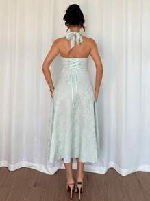 Modelyn Vestido verde menta de línea A con escote de cuello halter y cintura con nudo