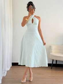 Modelyn Vestido verde menta de línea A con escote de cuello halter y cintura con nudo
