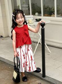 Young Girl Solid Color Round Neck Sleeveless Top With Ruffled Hem And All-Over Print Long Pants Summer Two-Piece Set