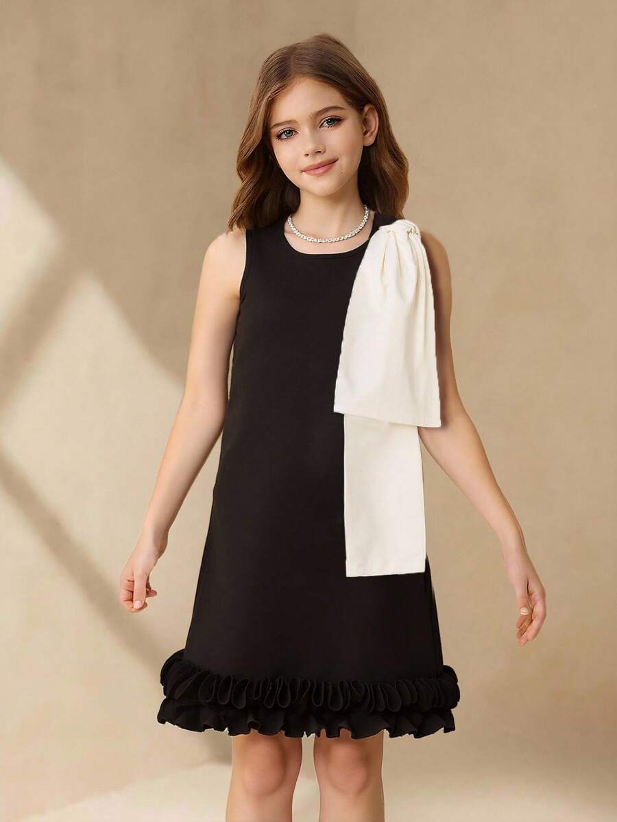 Vestido suelto, elegante y simple sin mangas con cuello redondo, con lazo desmontable, y acabado de volantes en contraste de color, adecuado para verano, boda, niña de las flores