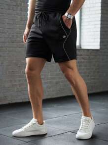 Manfinity BRENVOR Pantalones cortos rectos para hombres de punto, de moda casual, sueltos, de unicolor y cintura elástica
