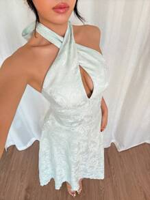 Modelyn Vestido verde menta de línea A con escote de cuello halter y cintura con nudo