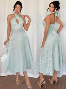 Modelyn Vestido verde menta de línea A con escote de cuello halter y cintura con nudo