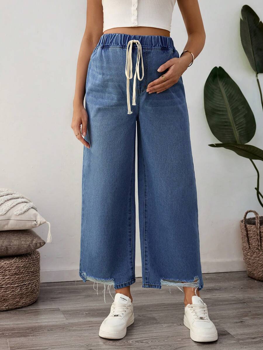 SHEIN Jeans de mezclilla con flecos y amarres a la cintura sueltos para embarazadas, adecuados para uso diario en verano