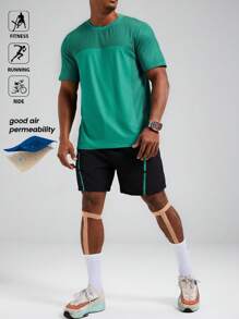 Manfinity Sport Polished Conjunto de ropa deportiva de 2 piezas para hombre con Top de cuello redondo de manga corta en verde y pantalones cortos negros - Conjunto de ropa para entrenamiento, correr