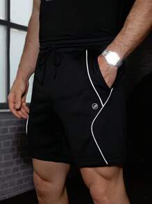 Manfinity BRENVOR Pantalones cortos rectos para hombres de punto, de moda casual, sueltos, de unicolor y cintura elástica