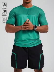 Manfinity Sport Polished Conjunto de ropa deportiva de 2 piezas para hombre con Top de cuello redondo de manga corta en verde y pantalones cortos negros - Conjunto de ropa para entrenamiento, correr