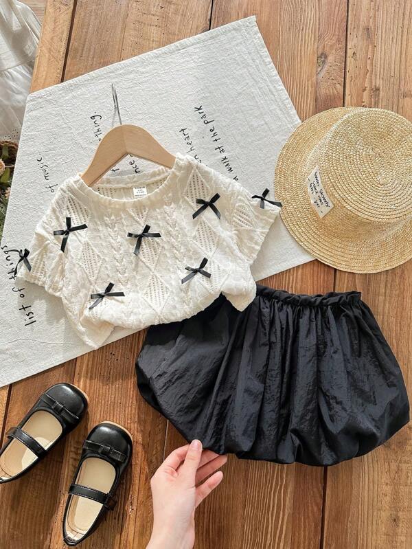SHEIN Babygirl Summer Cute Elegant Bow Decor Short Sleeve Top And Elastic Waist Skirt Set