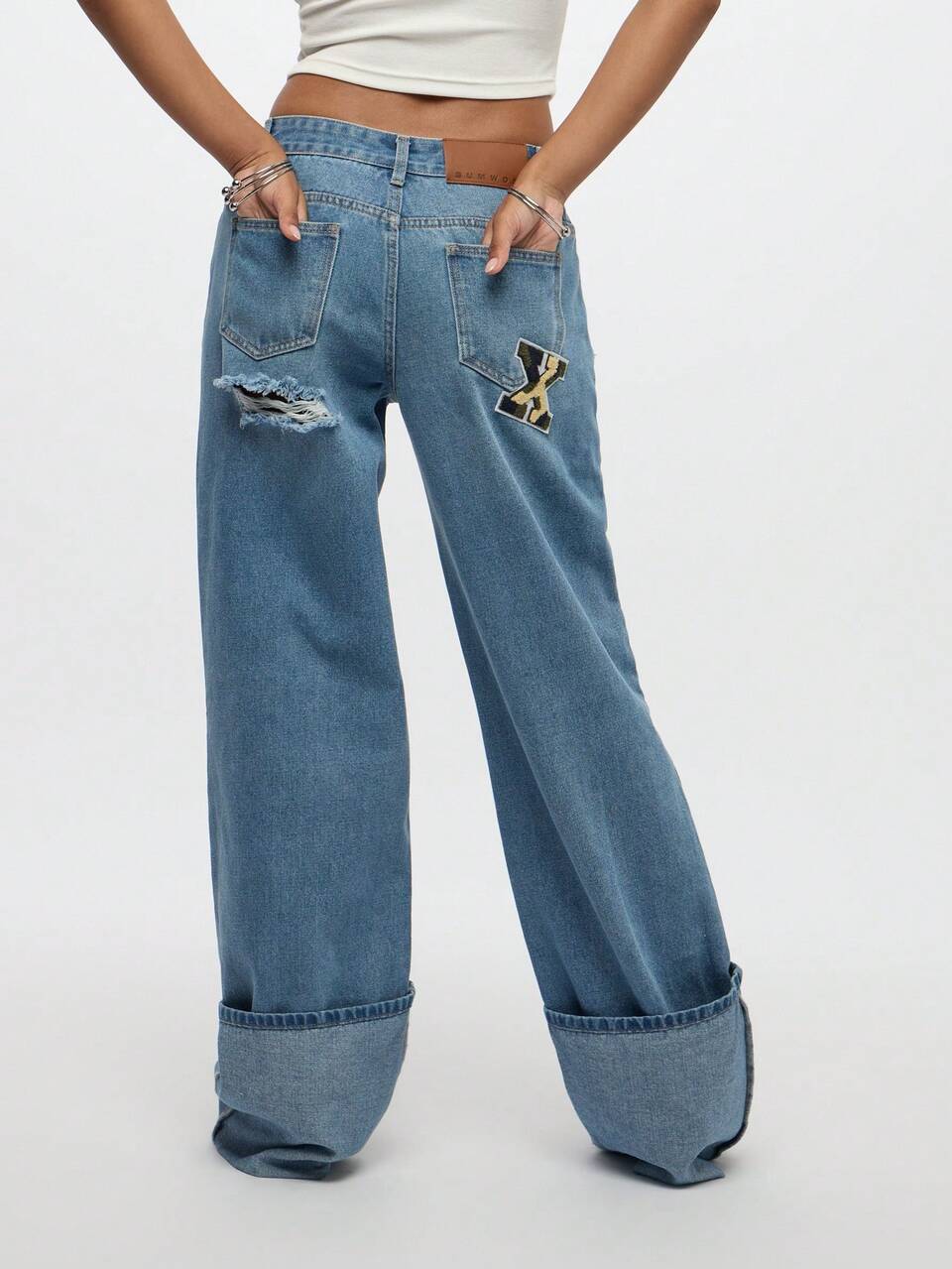 SUMWON WOMEN Jean baggy coupe décontractée à jambe extrêmement large et effet usé