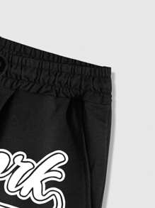 ROMWE MEN Street Life Pantalones cortos deportivos informales de verano para hombres, con estampado de números en inglés americano, color negro
