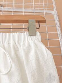 EMERY ROSE Shorts informales de mujer con cintura elástica blanca y bordados
