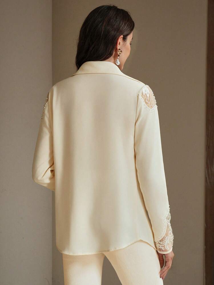 Élégant Chemisier à manches longues pour femme Oldmoney mode, inspiré du style occidental, avec détail de broderie ajourée perlée