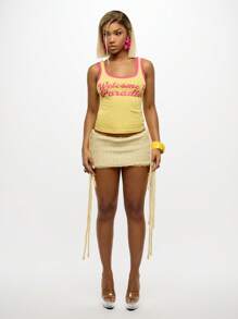 SUMWON WOMEN Minifalda con flecos texturizados para playa, festival de verano, estilo bohemio, con borlas laterales, para vacaciones, uso casual y fiestas - Crema - Ver 3