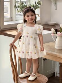 Vestido elegante de bebé niña con estampado floral de organza color albaricoque y dobladillo con volantes