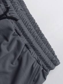 Manfinity Hypemode Shorts de verano sueltos y casuales con bolsillos laterales y cintura con cordón de un solo color